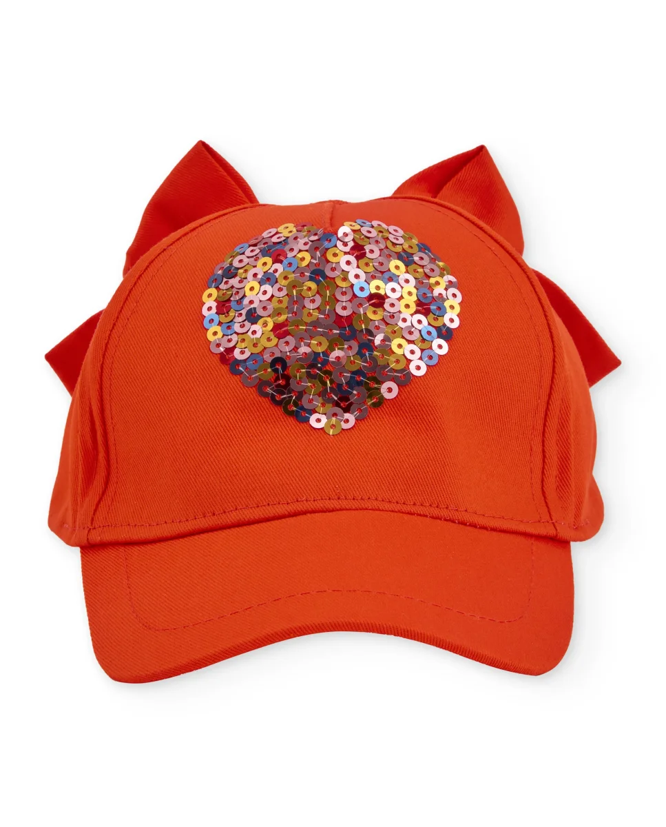 Gorra de niña de plana con corazón de lentejuelas