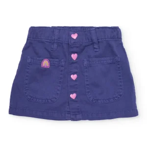 Falda de niña de plana y botones de corazón