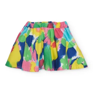 Falda de niña de plana con estampado de manchas