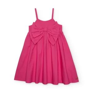 Vestido de niña de plana con un gran lazo