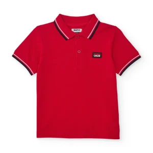 Polo de niño de punto con detalles en contraste